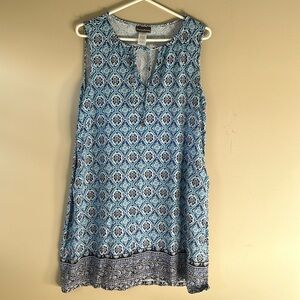 Tommy Bahama sleeveless dress with colorful all over print and tie vneck front